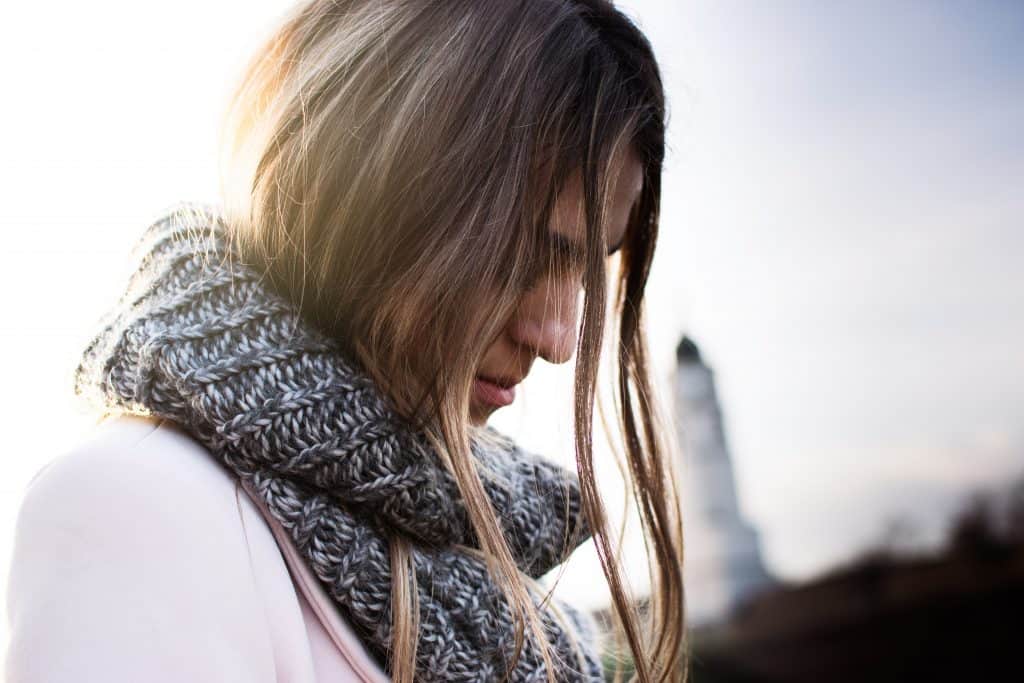 "What is wrong with me?" How to deal with these thoughts? 2 woman looking thoughtful, questioning what is wrong with me