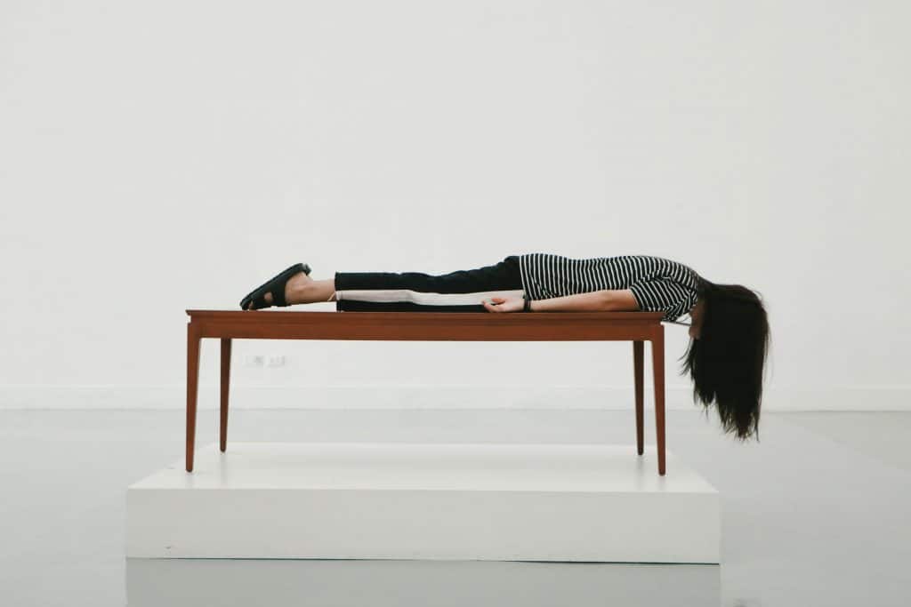 Woman lying on table