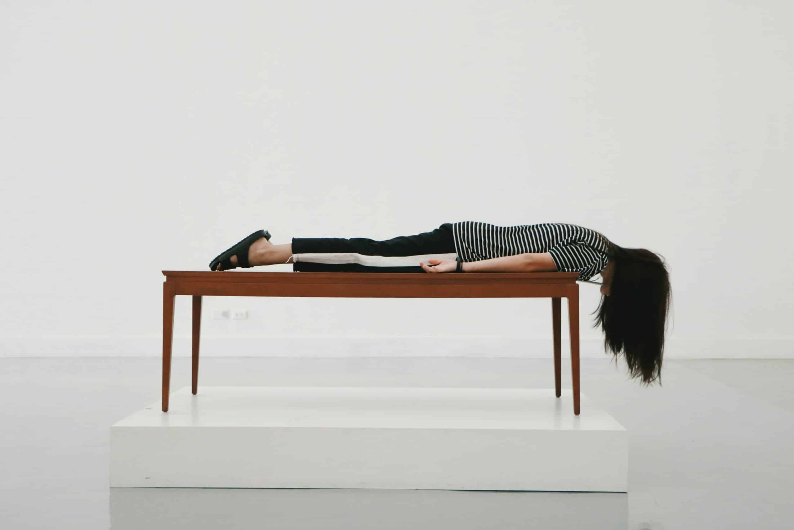Stop overthinking and live life to the fullest 8 Woman lying on table