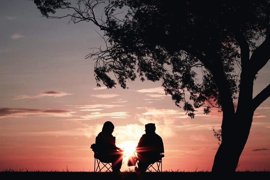 Effective communication - the key to a better life 6 Couple sat on camping chairs in the sunset