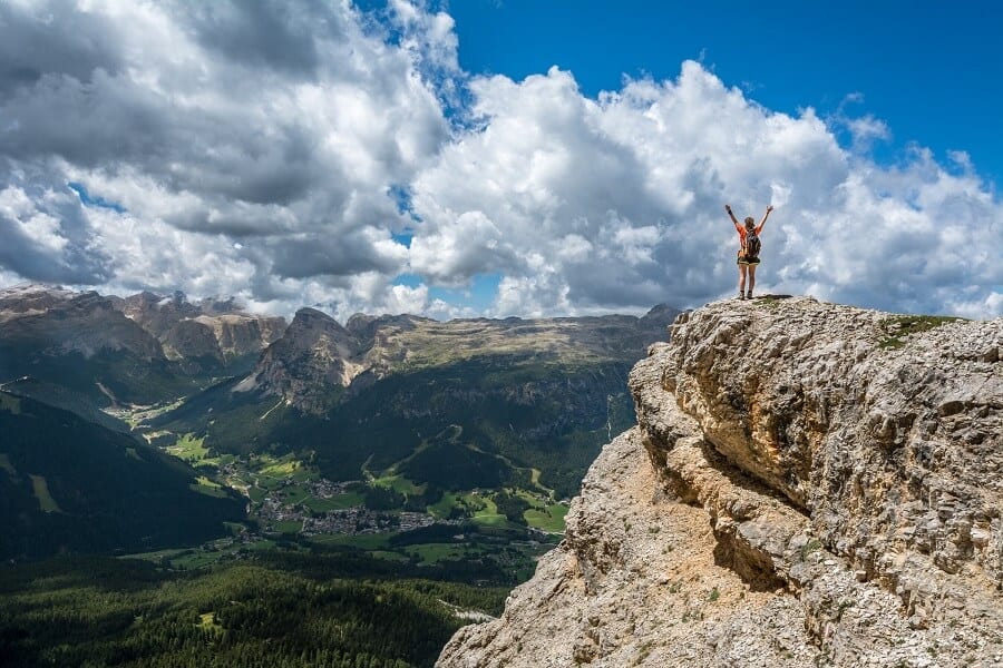 No motivation? Here is how to motivate yourself 3 Woman on top of a mountain banishing no motivation