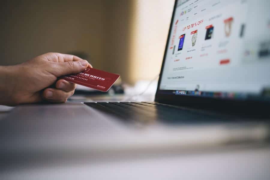 Is Money Addiction Real? How To Break Bad Spending Habits 14 person shopping online