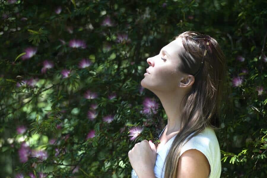 12 Ways To Beat The Sunday Blues 4 woman taking a breath to help the Sunday blues