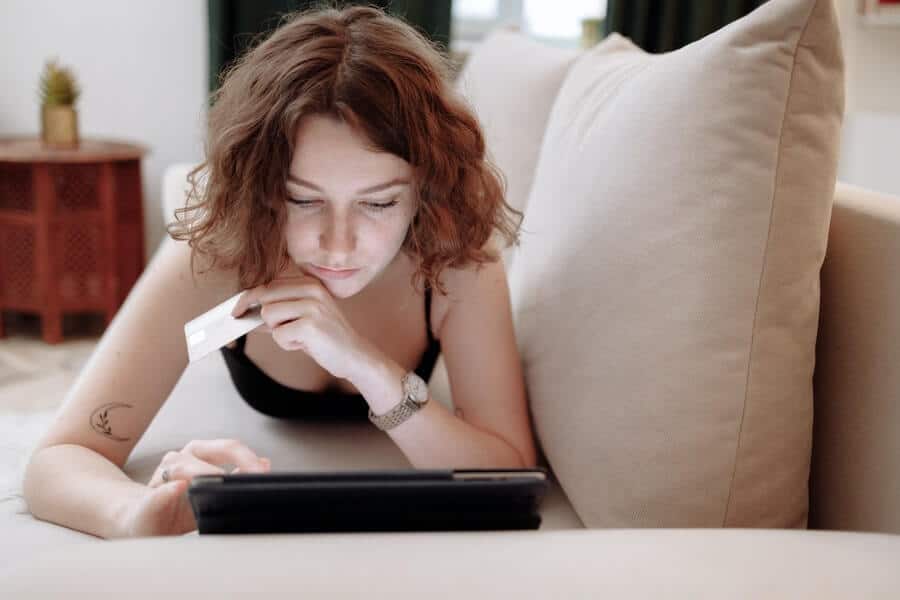 Is Money Addiction Real? How To Break Bad Spending Habits 9 woman shopping online